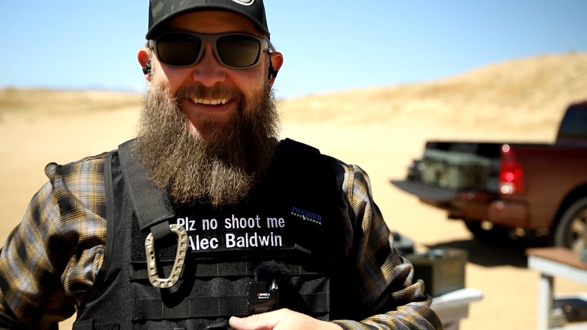 Shawn Herrin smiling at an outdoor range